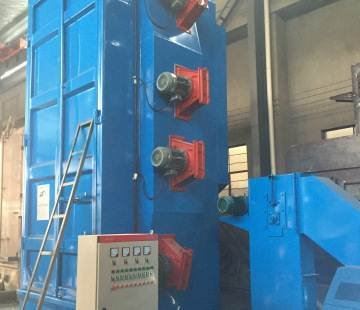 Double Station Rotary Table Shot Blasting Machine + Manipulator Unloading