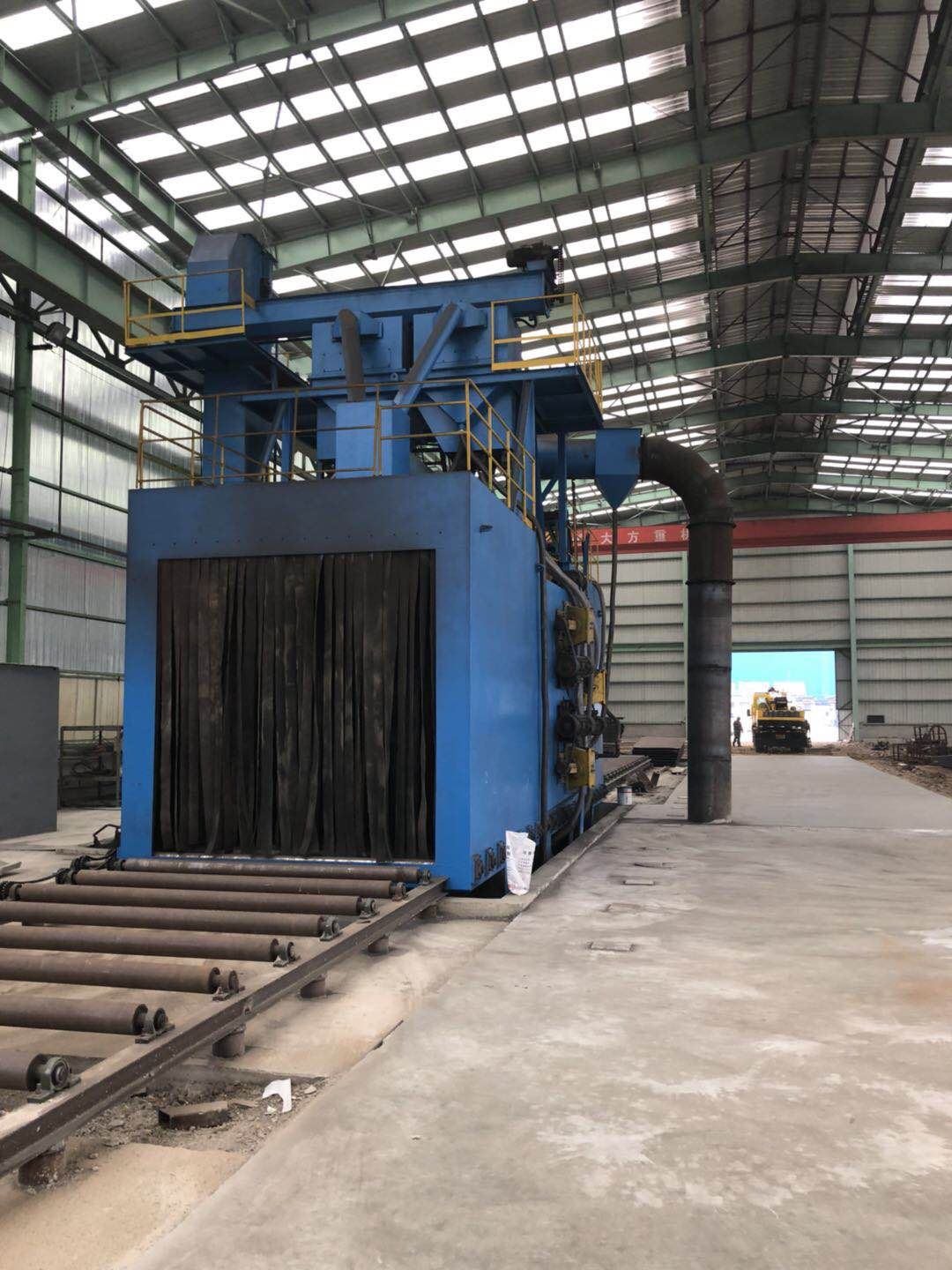 Working principle of axle-through shot blasting machine