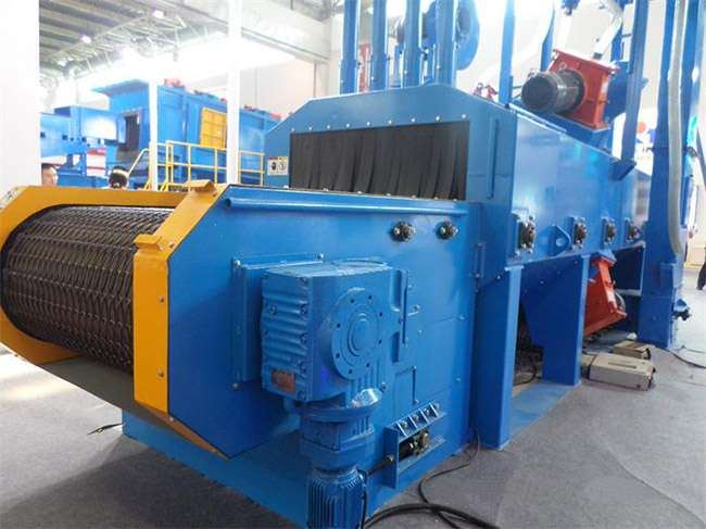 Working principle of mesh belt through shot blasting machine